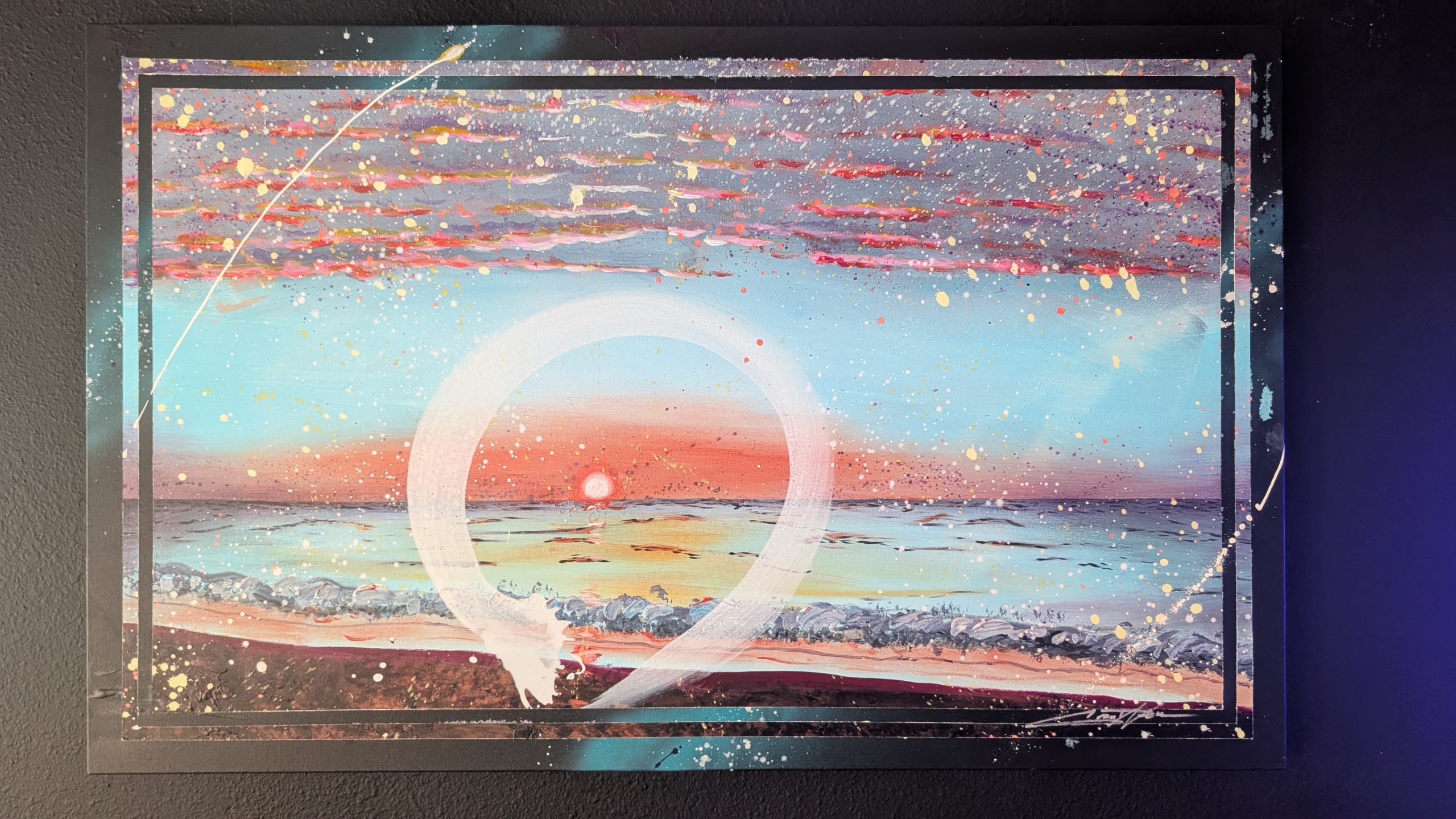 Coastal Space — a white ensō circle brushed around a rising sun over an ocean horizon, with streaked morning clouds and white paint-splatter across the canvas.